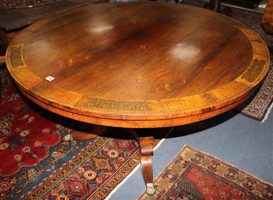 A George IV rosewood and brass inlaid centre table, W131cm